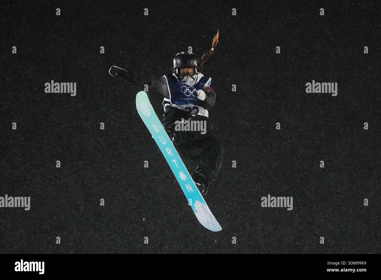 China's Zhang Xiaonan practices during a snowboard big air training ...