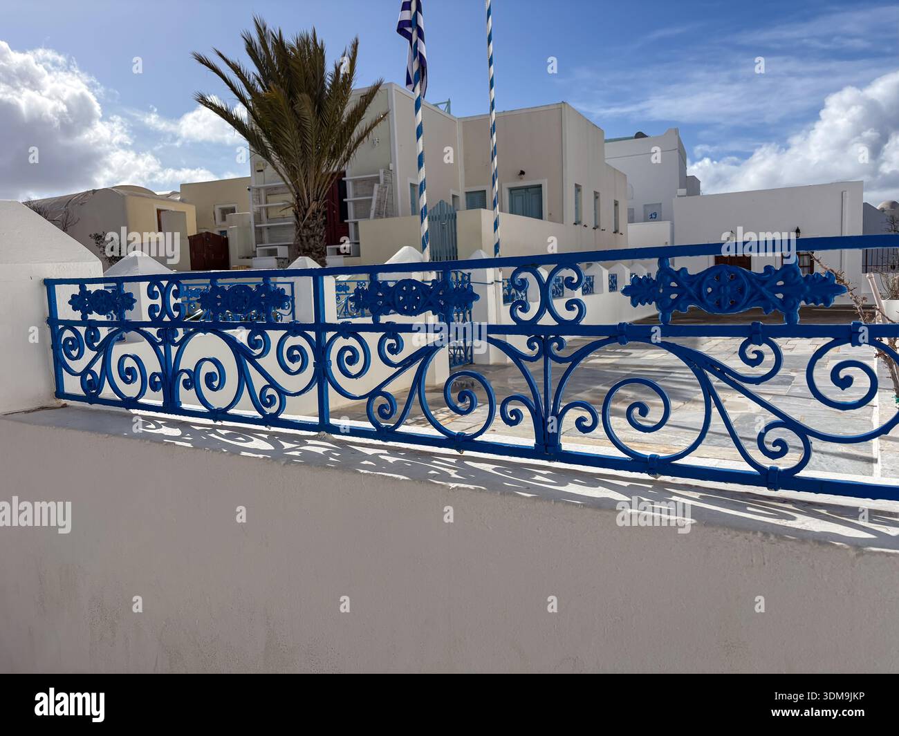 Ornate bright blue wrought iron balcony railing contrasting white ...