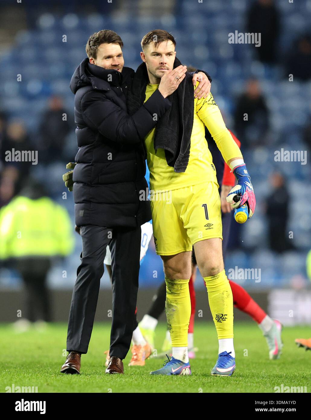 Rangers manager Danny Rohl greets goalkeeper Jack Butland following the ...