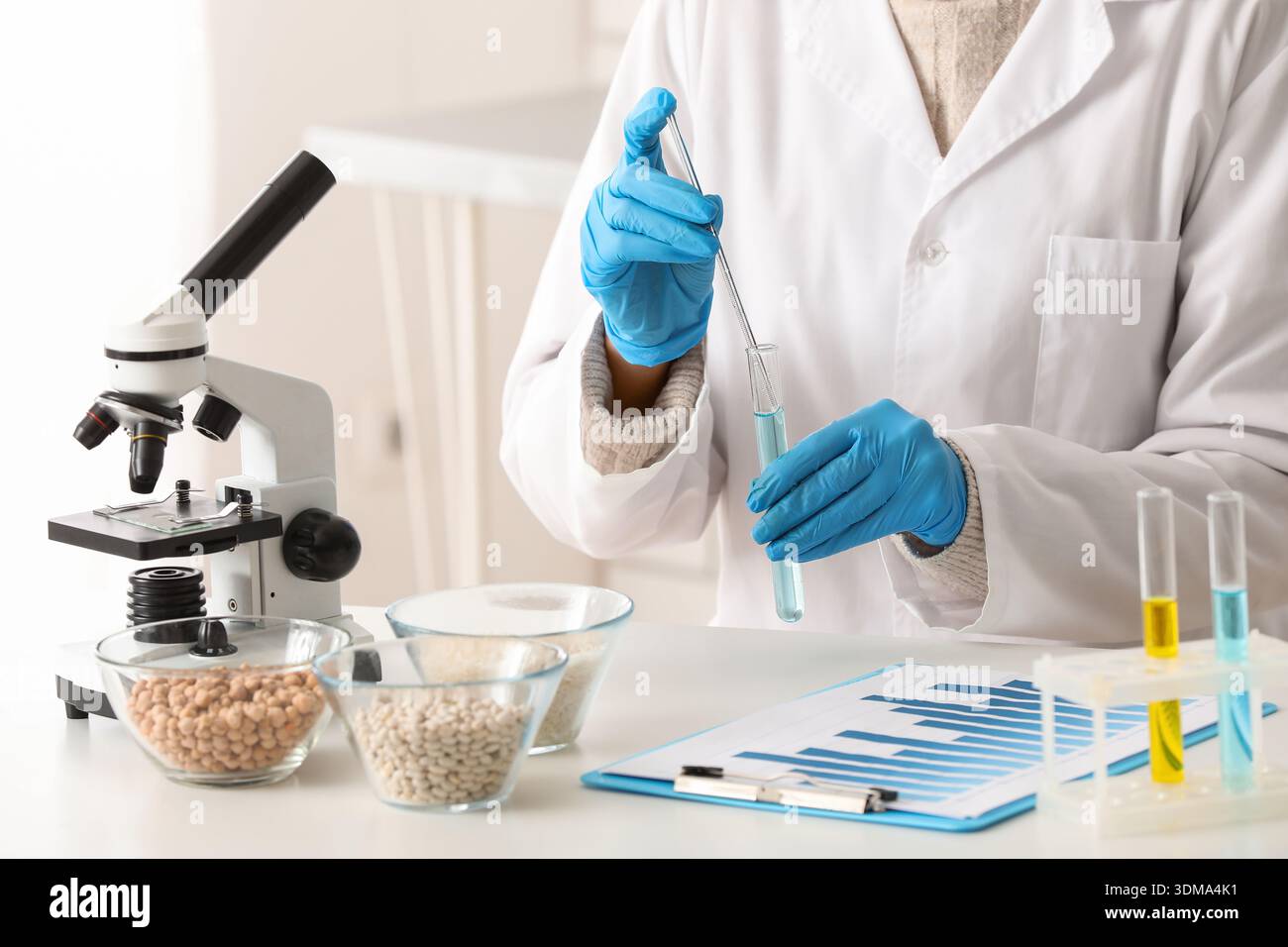 Scientist testing products in laboratory. HACCP concept Stock Photo