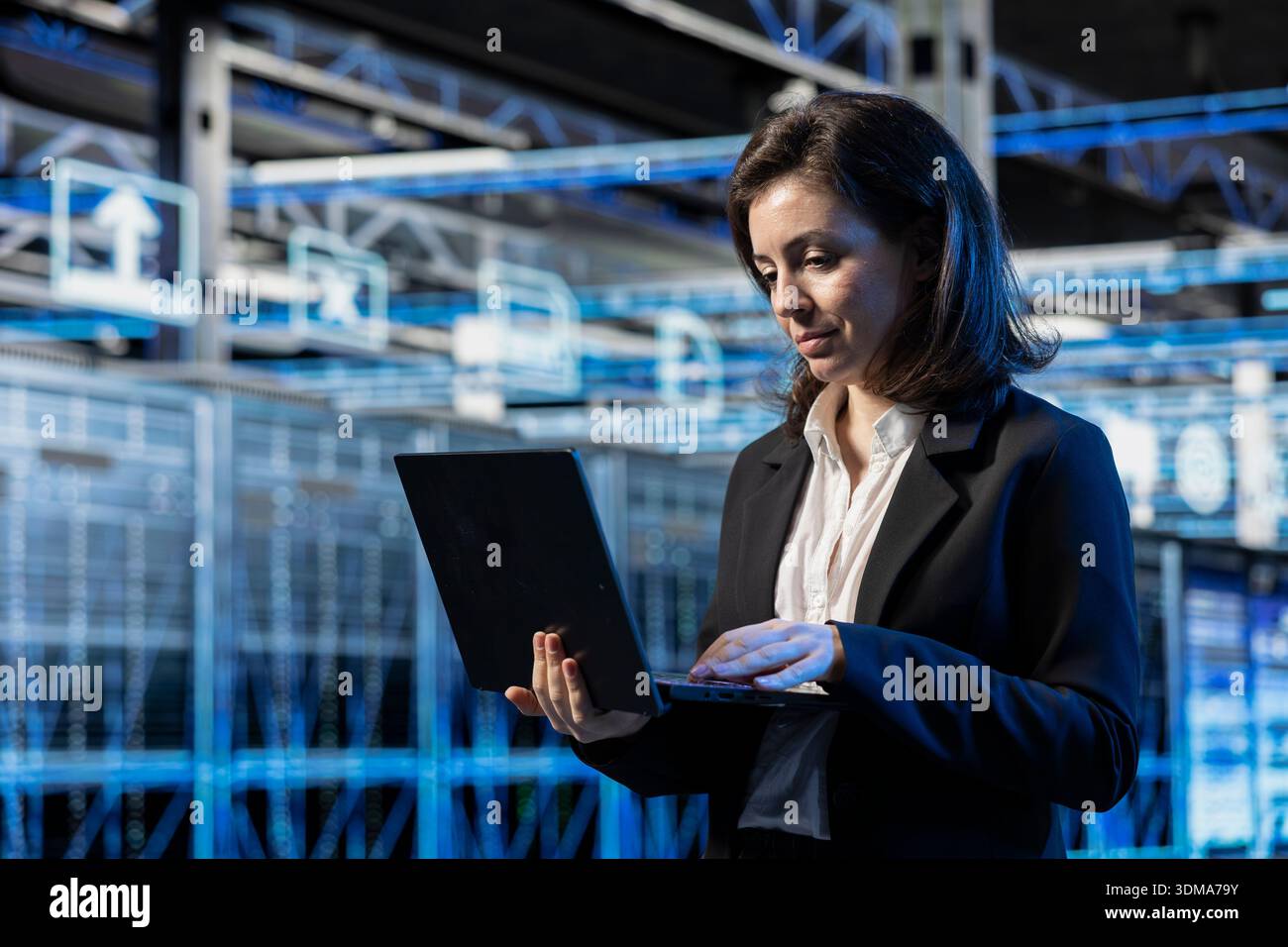 Augmented reality, laptop and programmer in server hub, optimizing equipment. Worker, data center, system architecture electronics update, VFX compositing futuristic technology concept Stock Photo