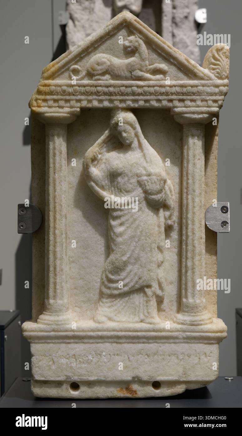 Punic votive stele with offering woman, 3rd century BC. Musei Reali di Torino, Turin, Italy. Stock Photo