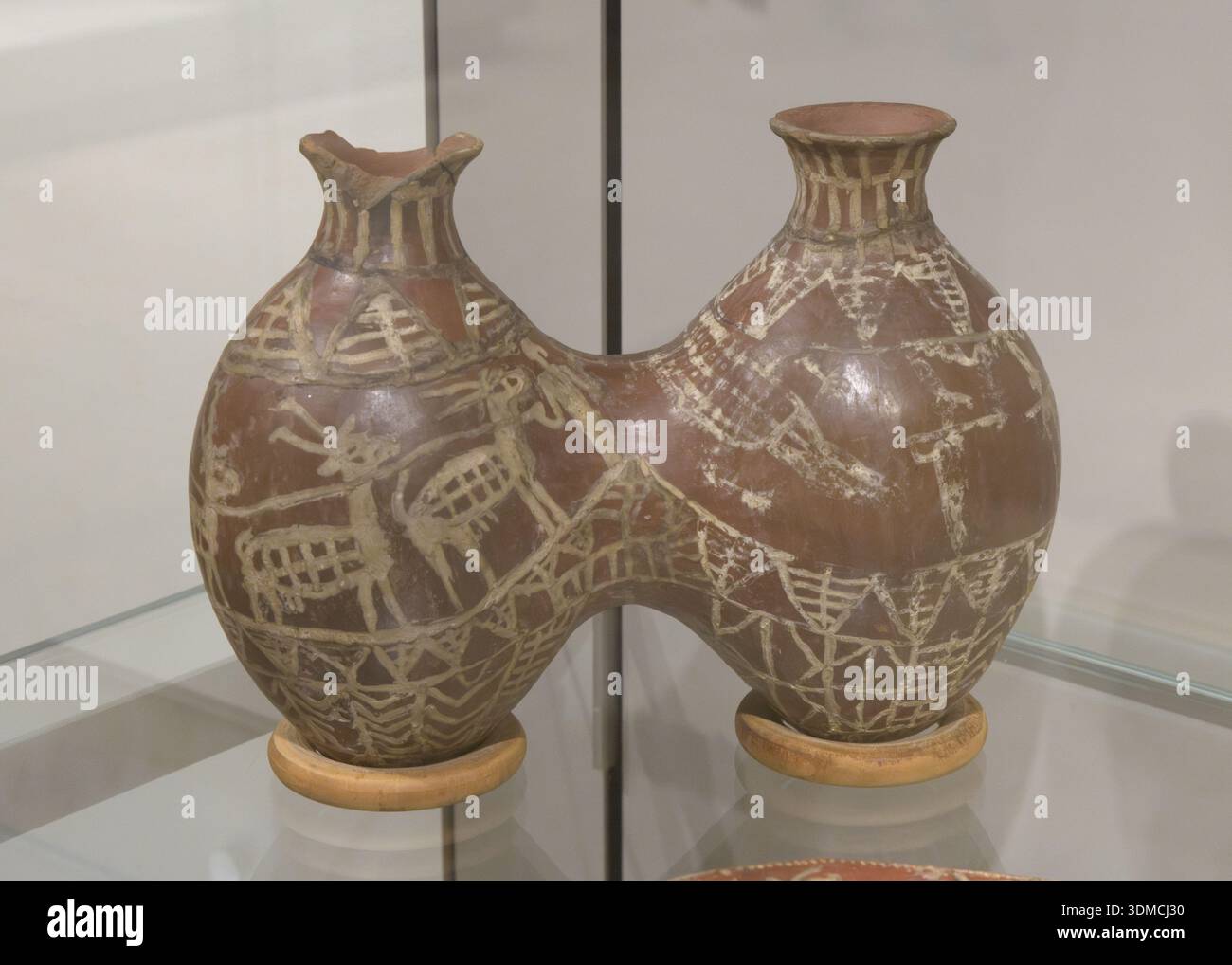 A Predynastic double-jar (C-Ware) from Sedment, Egypt, dating to the Naqada I period (3900â3700 BCE), featuring hunting scenes painted by two differ Stock Photo