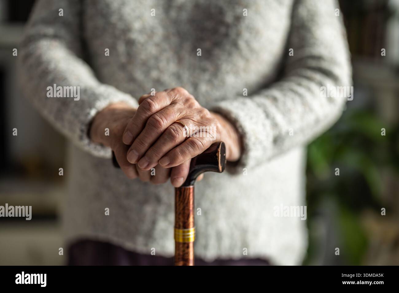 Woman with a stick hi-res stock photography and images - Alamy