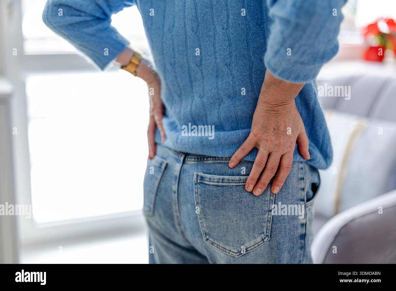 Senior woman suffering from back pain Stock Photo
