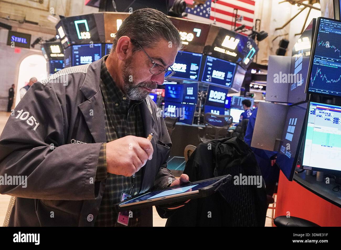 Trader Robert Oswald Works On The Floor Of The New York Stock Exchange trader-robert-oswald-works-on-the-floor-of-the-new-york-stock-exchange