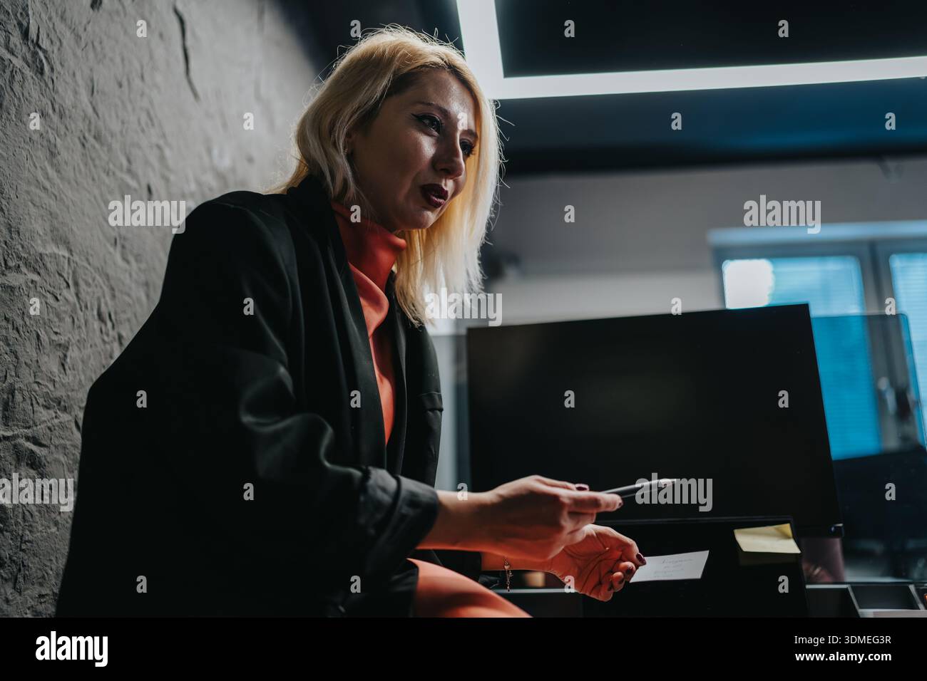 Professional woman in black blazer hi-res stock photography and images ...