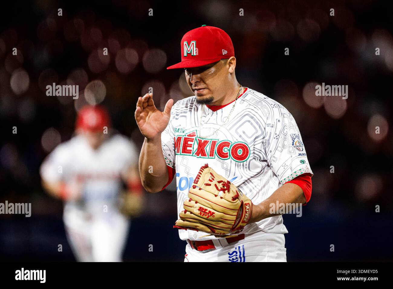 ZAPOPAN, MEXICO - FEBRUARY 4: Ronald Medrano starting pitcher reacts in ...