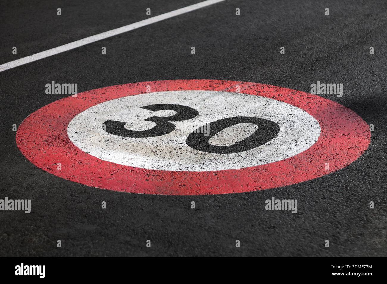 Zone 30 speed limit speed limit road marking hi-res stock photography ...