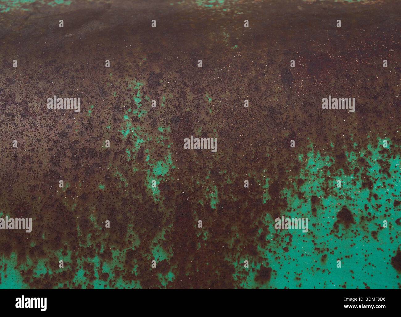 Rusty surface with exfoliated paint in turquoise using as background Stock Photo