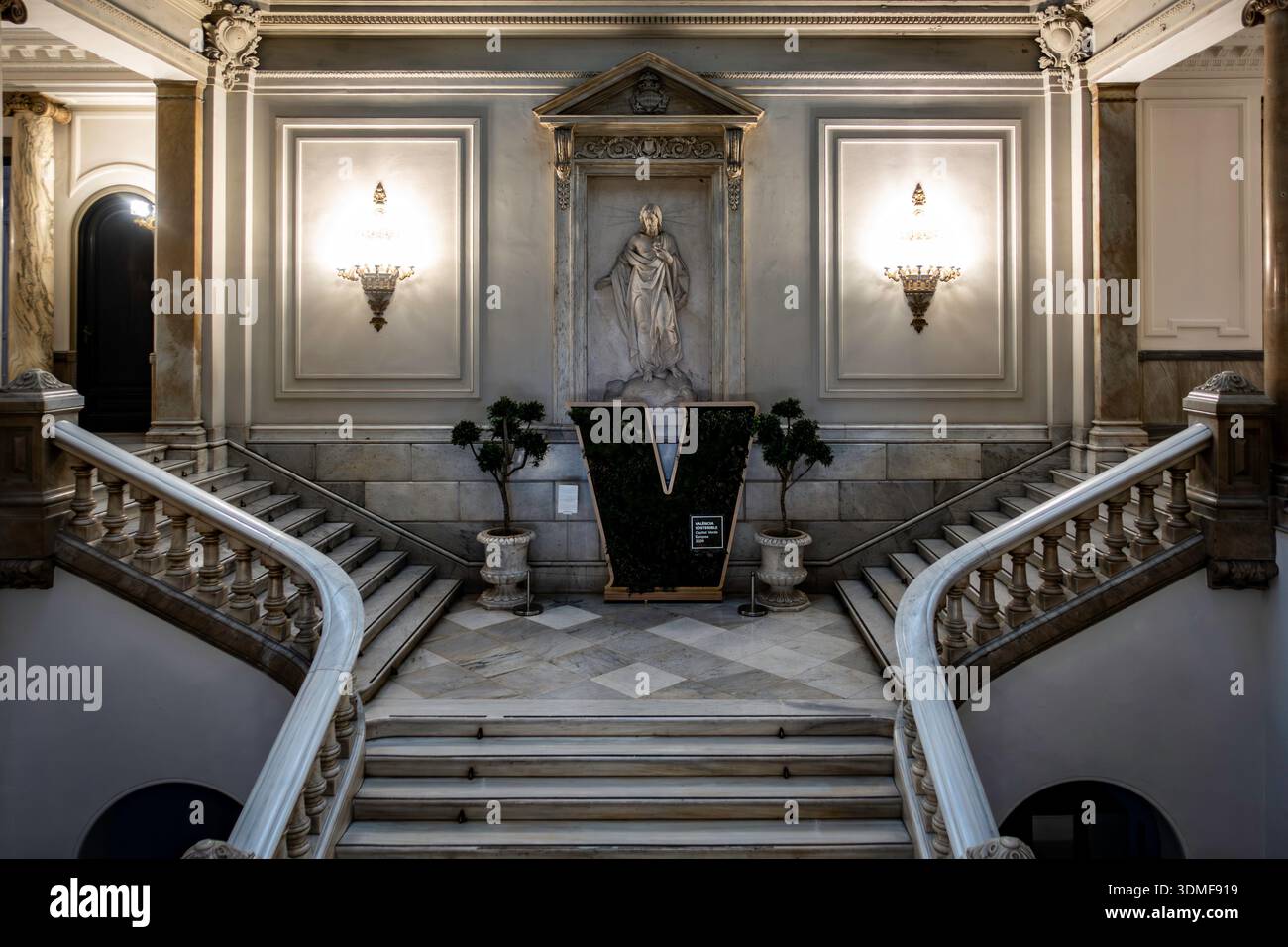 Elegant grand marble staircase and neoclassical sculpture at the ...