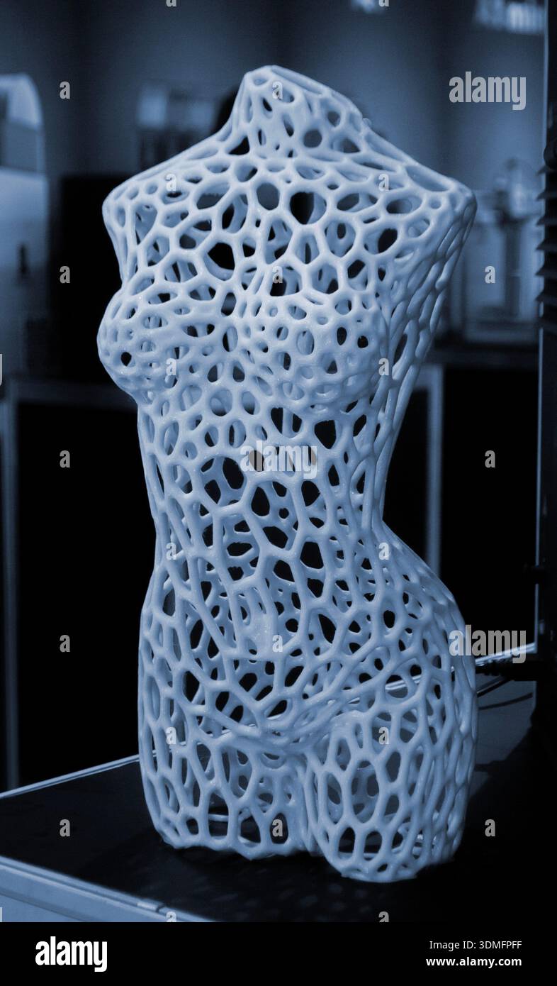 Art model female body printed on 3D printer from molten plastic. Object ...