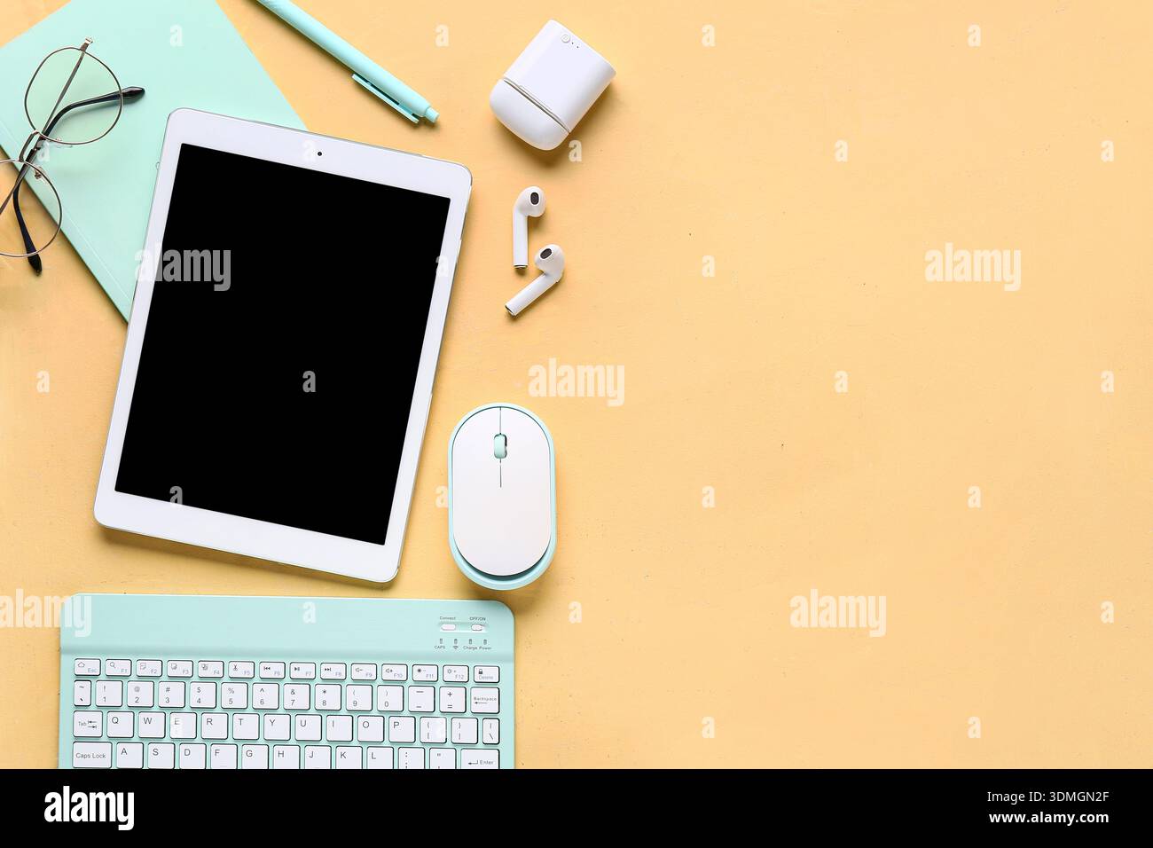 Composition with different modern gadgets and stationery on beige background Stock Photo