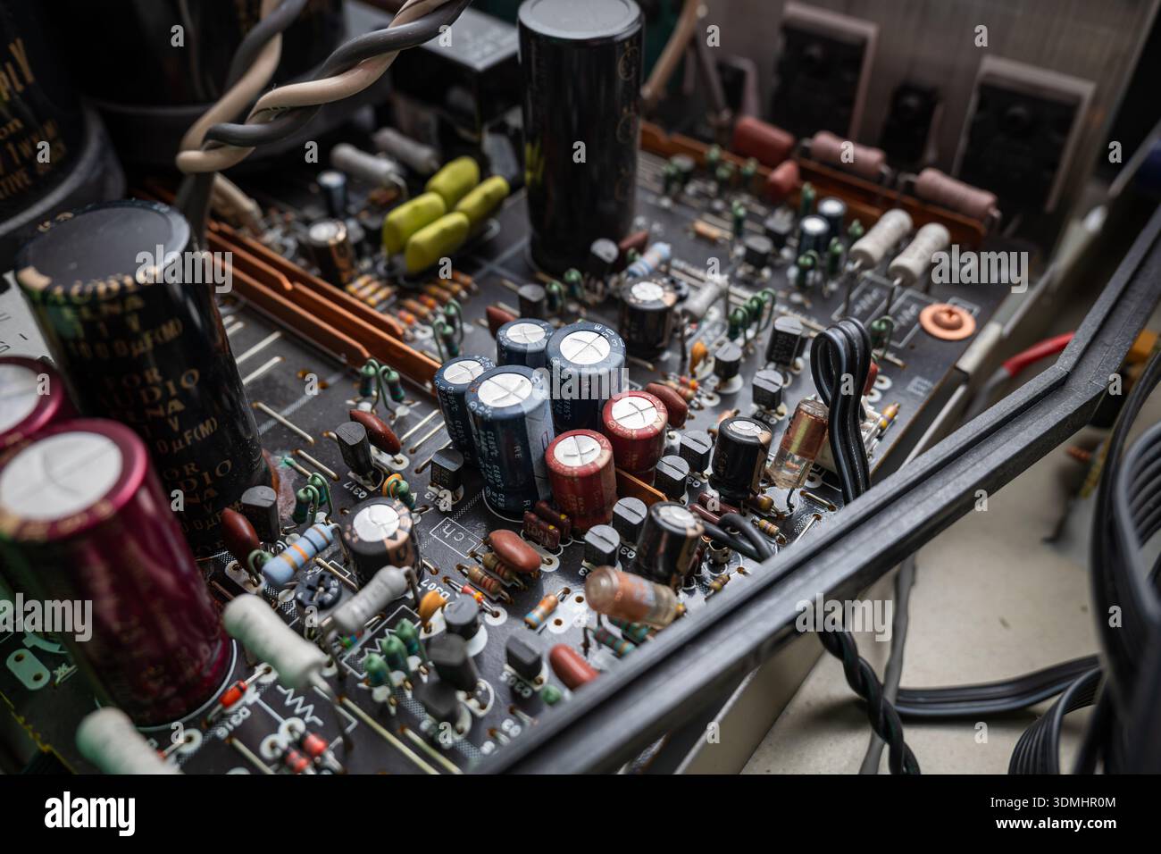 Internal view of complex electronic circuit board. Top down, close up ...
