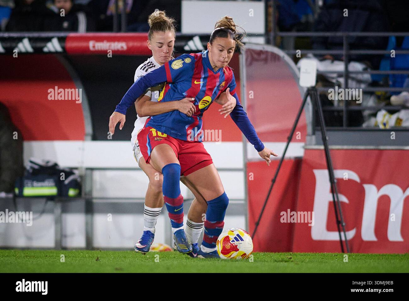 Real Madrid CF’s Irune Dorado (L) and FC Barcelona’s Clara Serrajordi ...