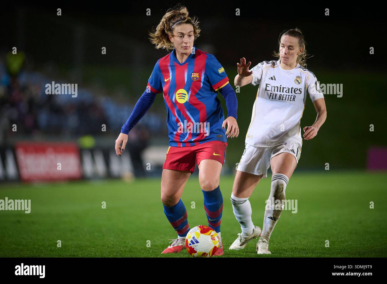 Real Madrid CF’s Sandie Toletti (R) and FC Barcelona’s Alexia Putellas ...