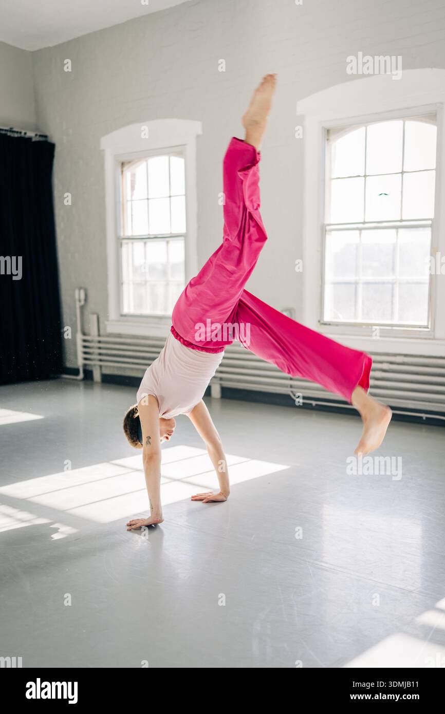 Dancer Handstand Dancer performing handstand vibrant hi-res stock photography and images ...
