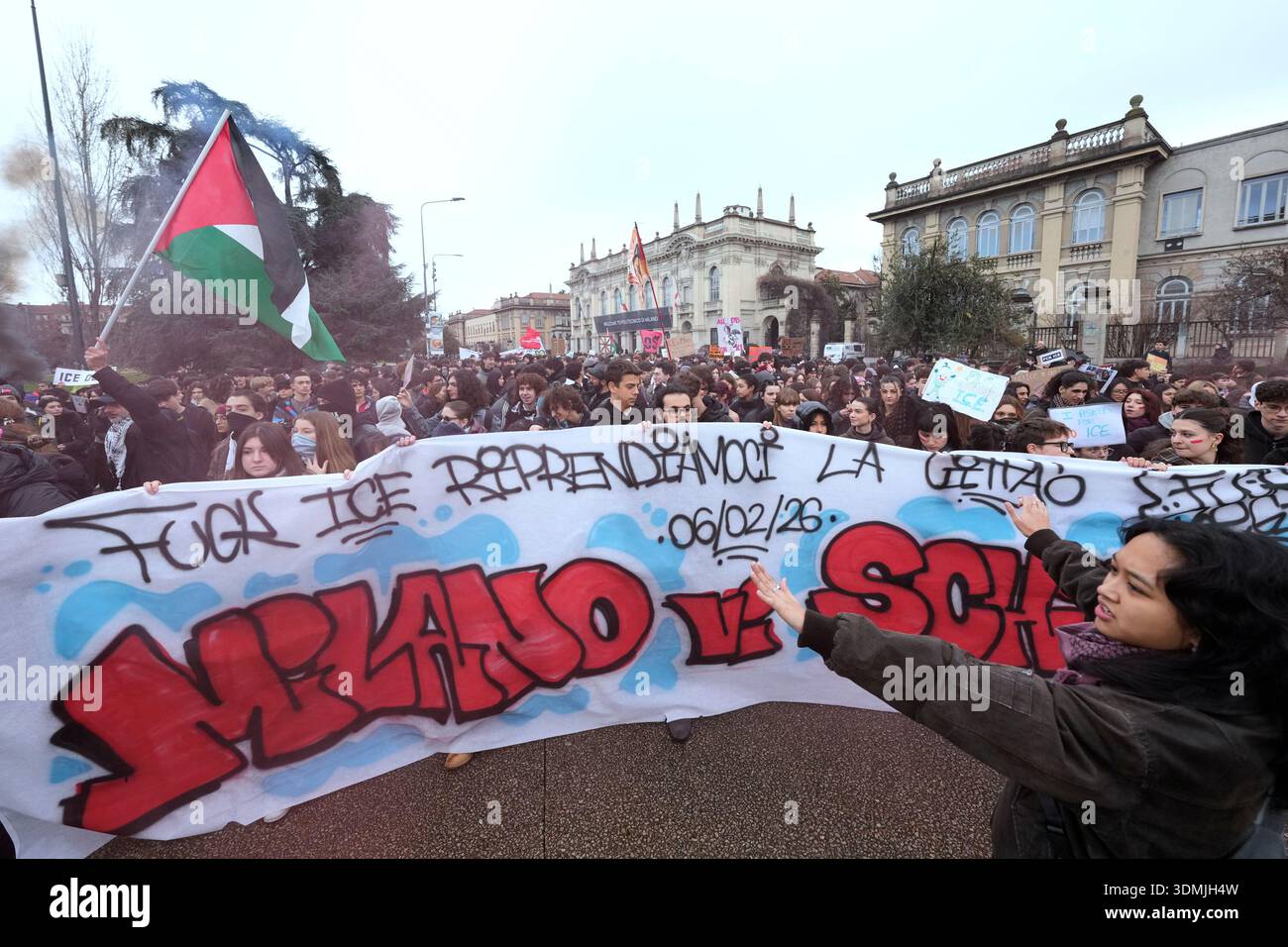 EDS NOTE: OBSCENITY - Protesters walk with a banner during a ...