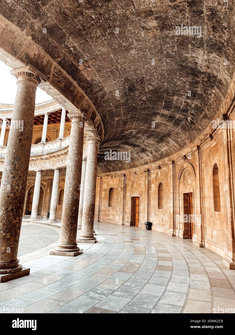 Historic European palace courtyard with renaissance colonnade and stone ...