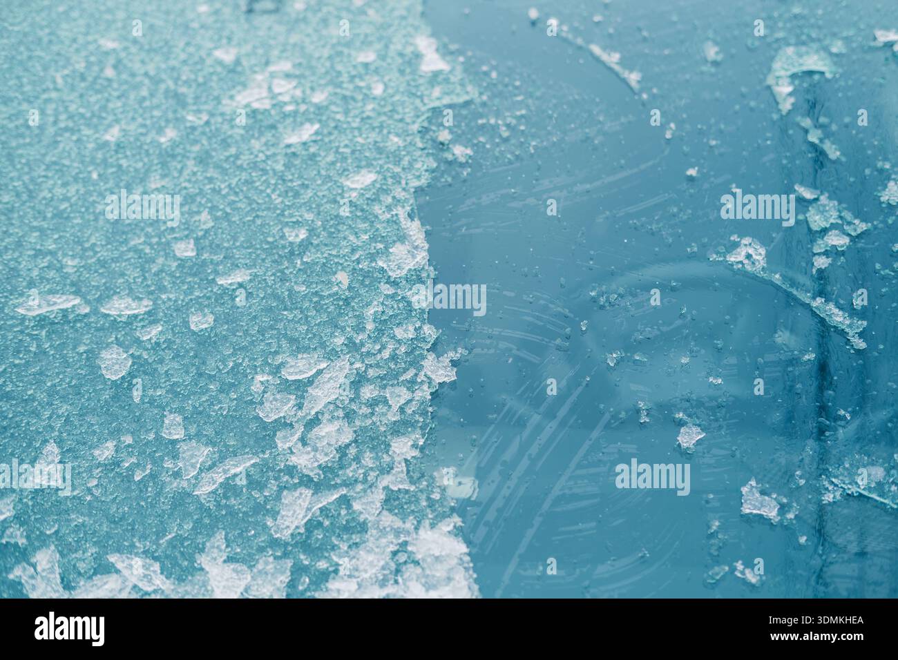Ice Pattern Closeup. Precise Capture Of Thawing Ice Motifs And Textured Surface With Reflective Hues Stock Photo