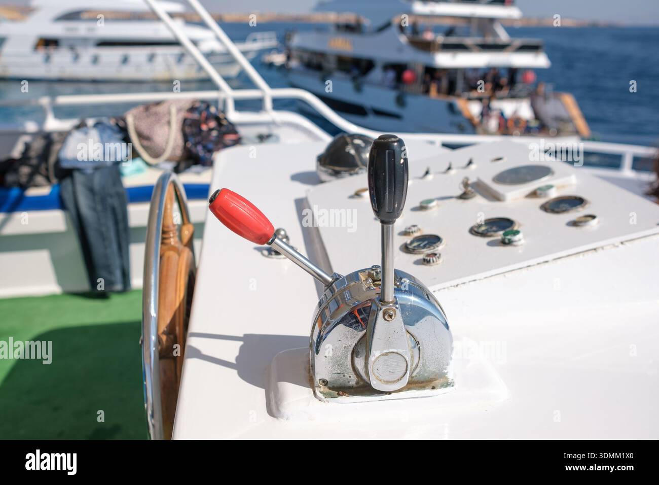 Shift Offloading Boat Boat control lever features throttle and gear shift on a yacht deck ...