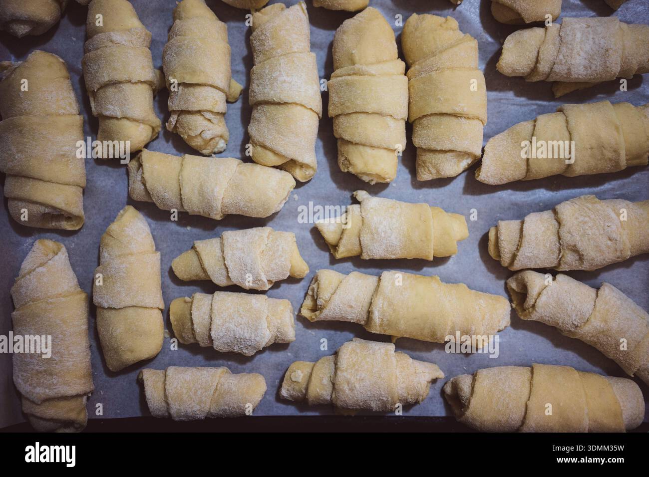 Making butter rolls at home, dough details. Stock Photo