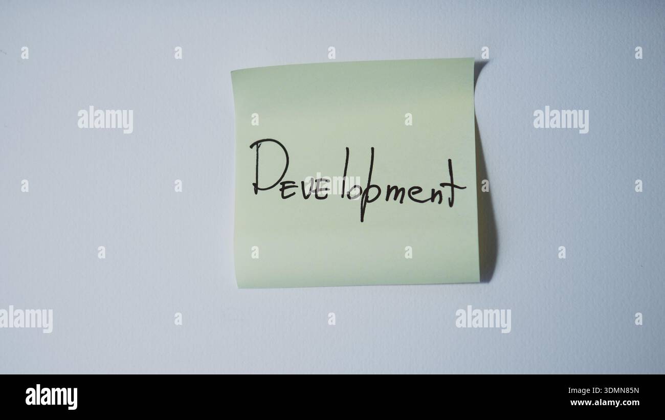 Development Handwritten on Sticky Note Stock Photo