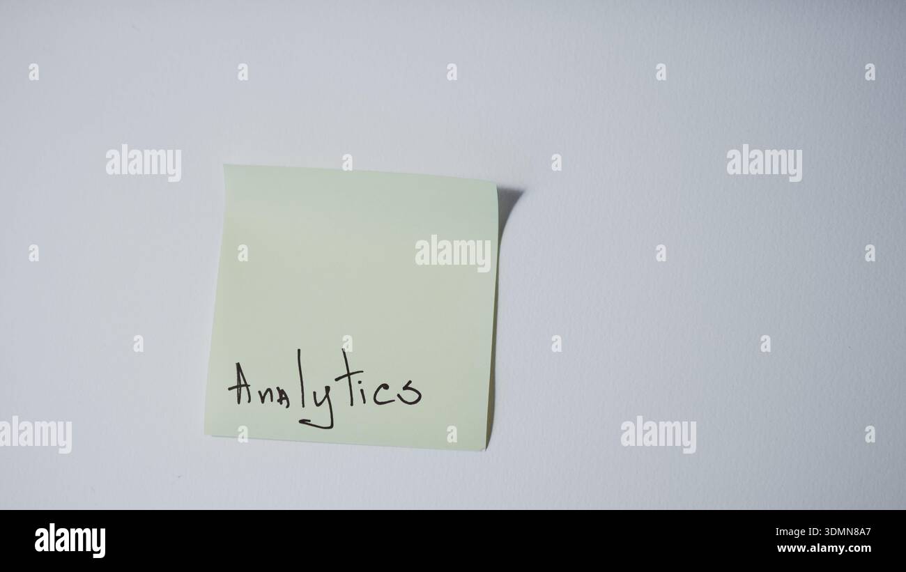 "Analytics" Handwritten on Green Sticky Note 鈥 Data Analysis and Business Intelligence Concept Stock Photo