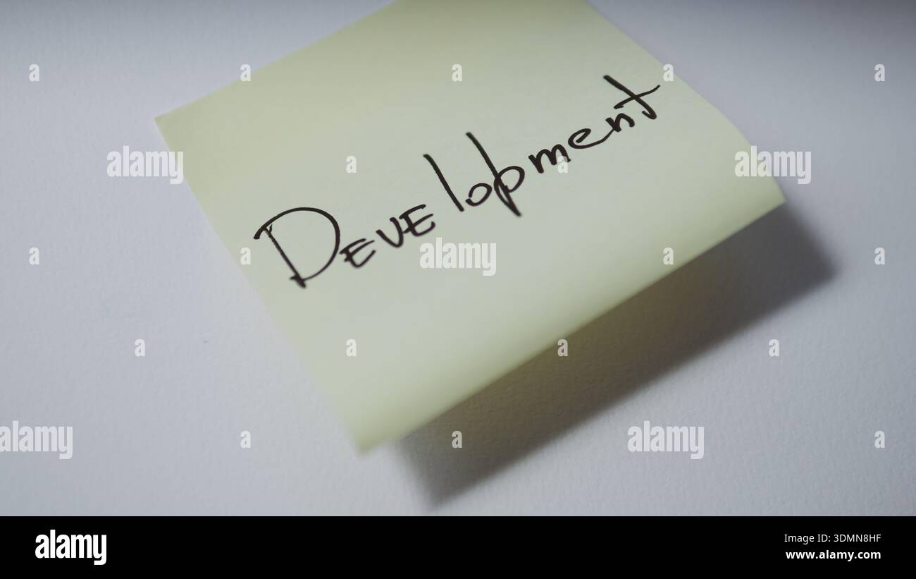 Development Handwritten on Sticky Note Stock Photo