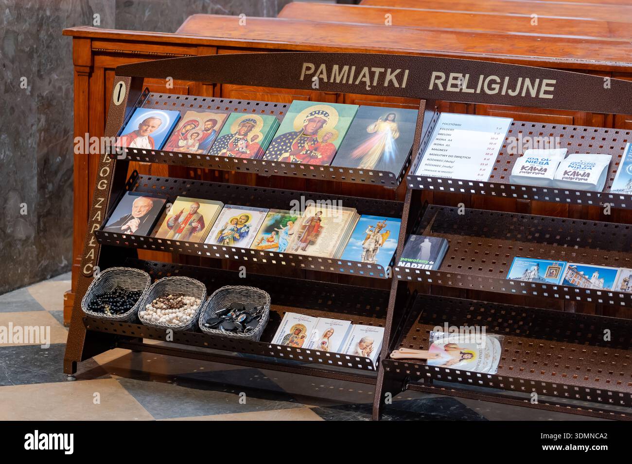 Pamiatki religijne religious souvenirs stand inside a Polish church ...