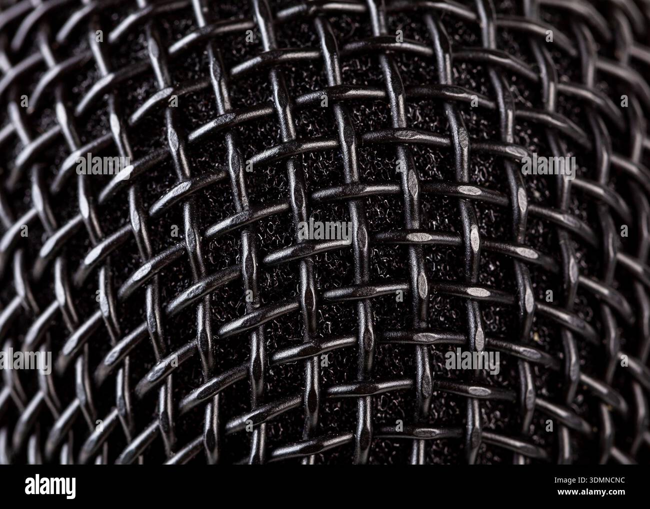 Abstract black microphone grille mesh macro texture, extreme closeup of ...