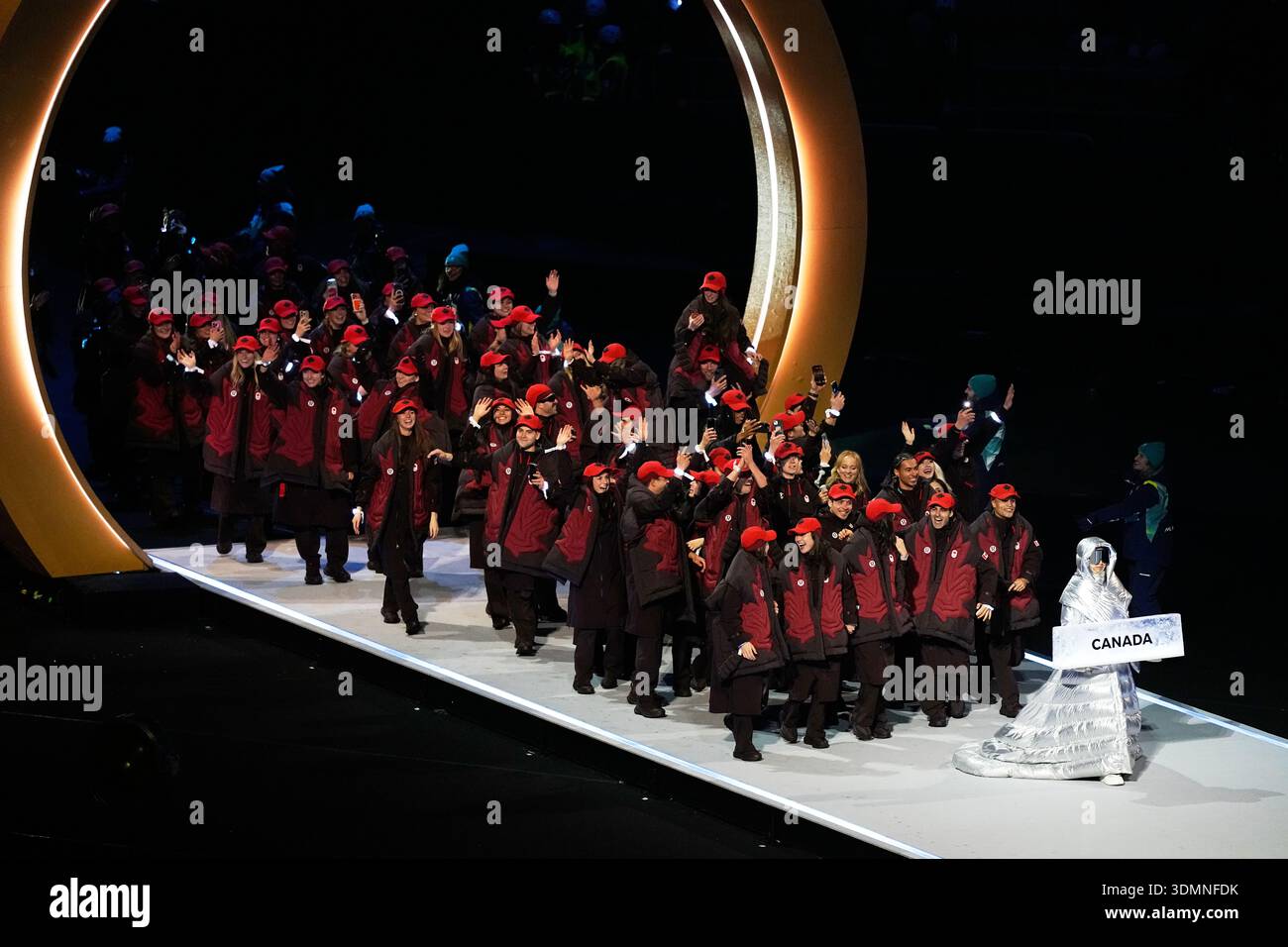 Athletes from Canada attend the Olympic opening ceremony at the 2026 ...