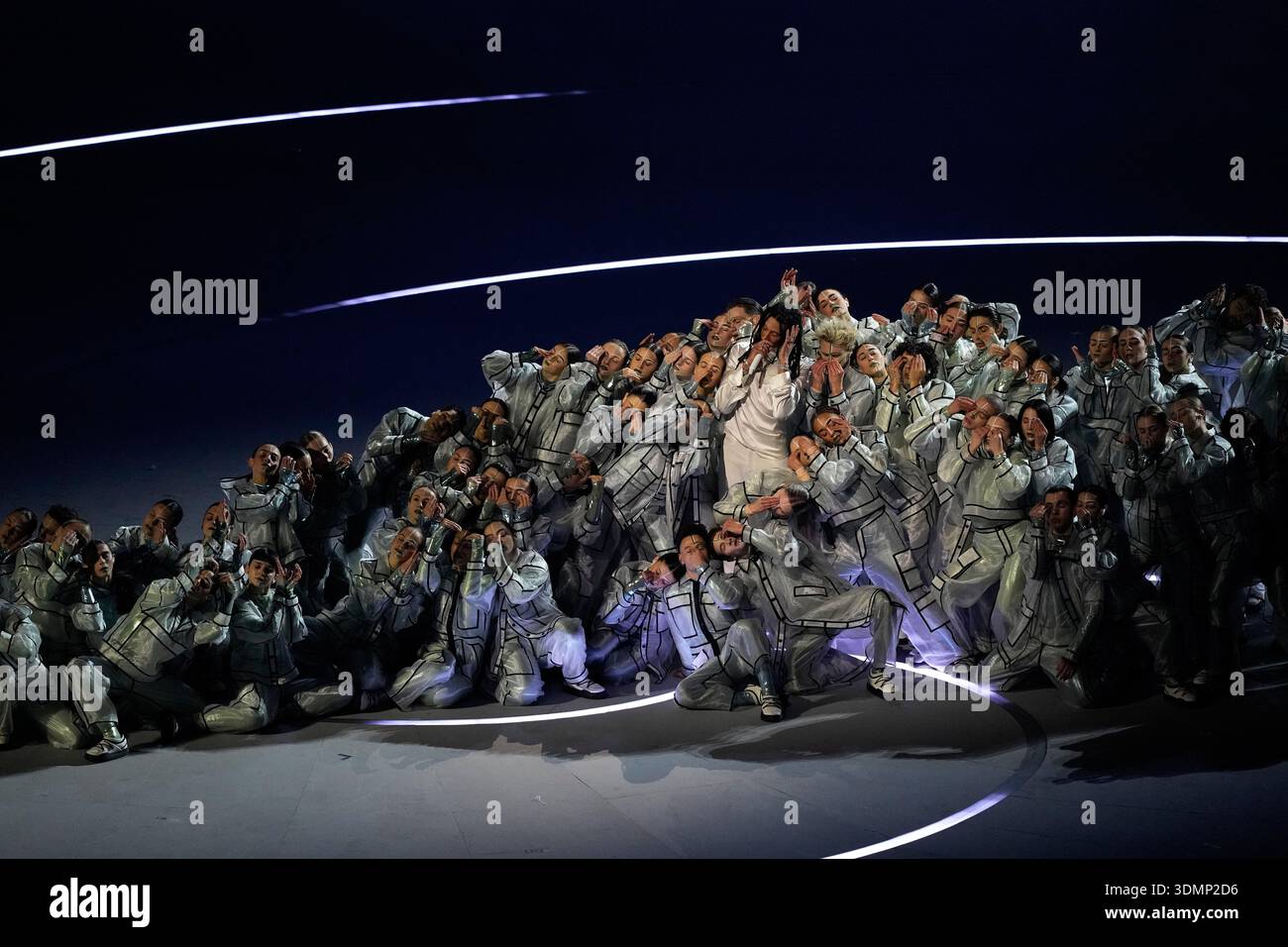 Italian rapper Ghali, center, performs during the Olympic opening ...