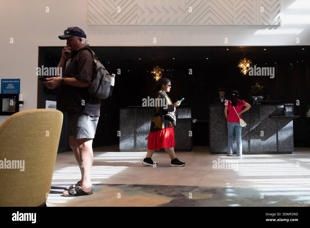 Hotel lobby guests hi-res stock photography and images - Alamy