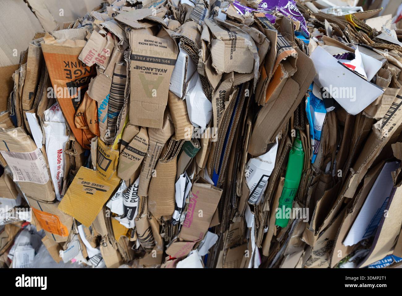 Compressed Paper Packing Compressed cardboard packaging stacked for recycling and waste ...