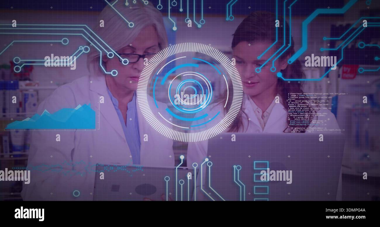 Two women wearing white lab coats analyzing laptop and tablet amid lab ...