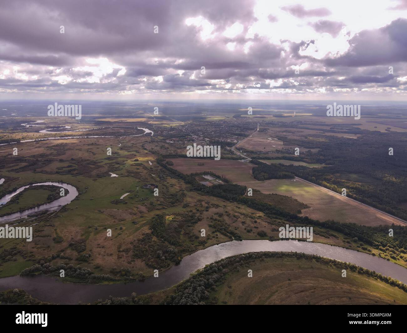 Aerial view of Lithuanian meandering rivers and oxbow curves, patchwork ...