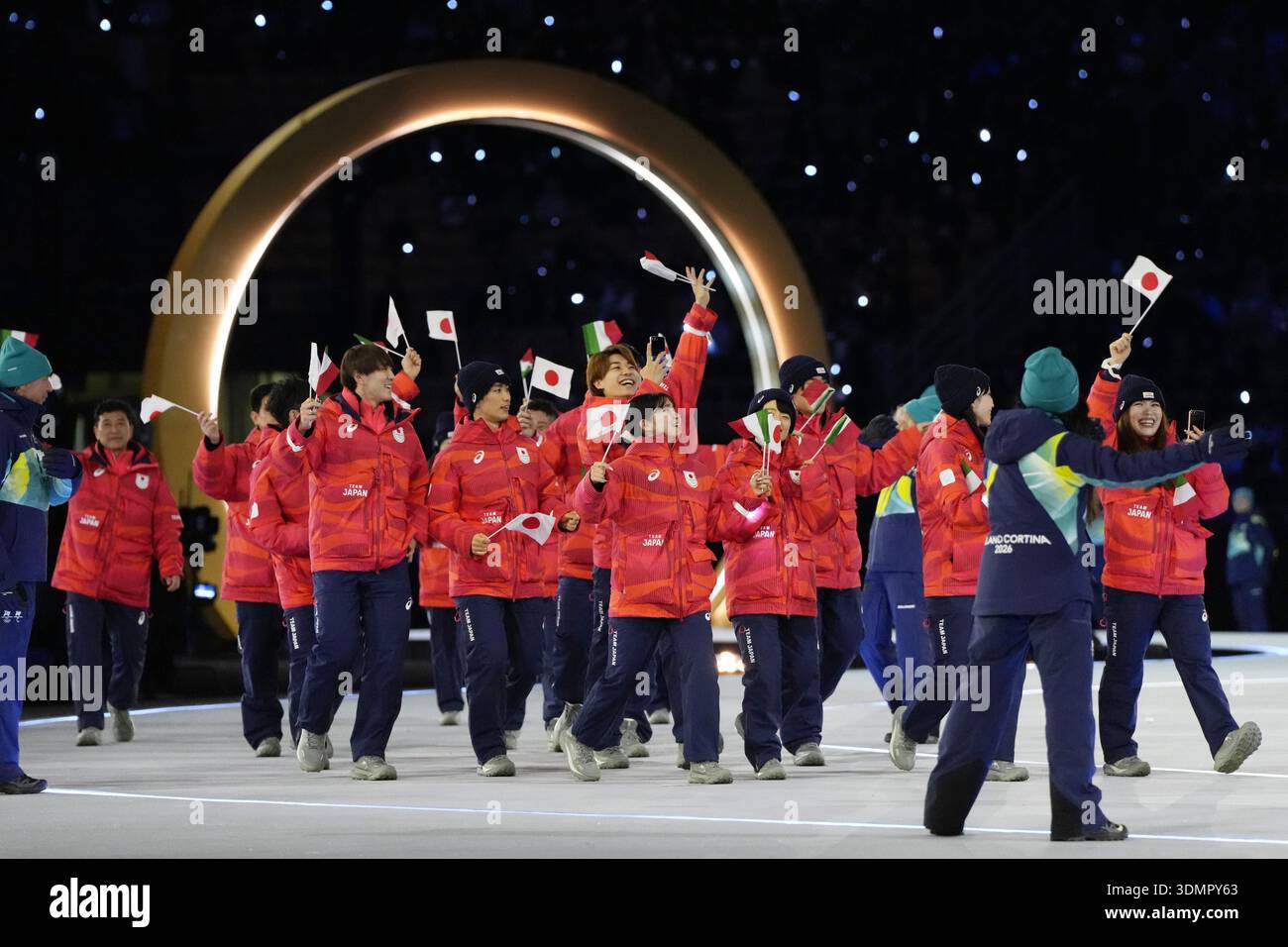 Japanese athletes march during the opening ceremony of the Milan ...