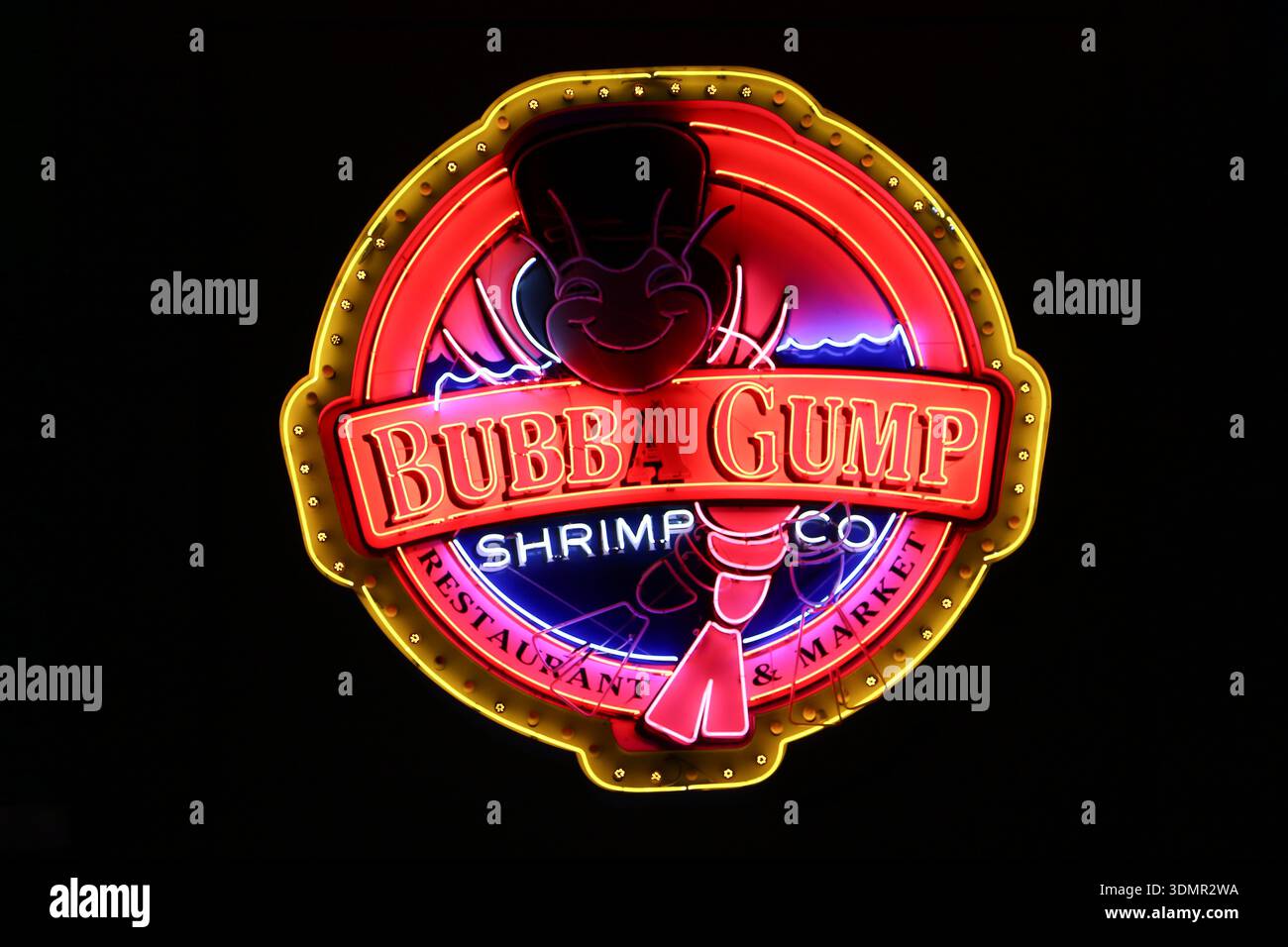 The iconic illuminated red neon sign of Bubba Gump Shrimp Co ...