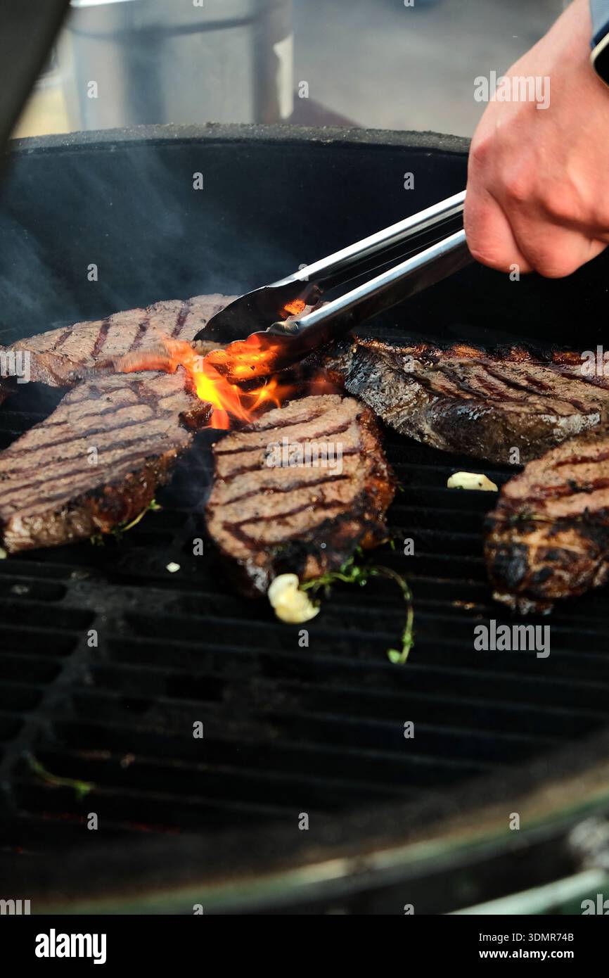 Close up hands turn beef hi-res stock photography and images - Alamy