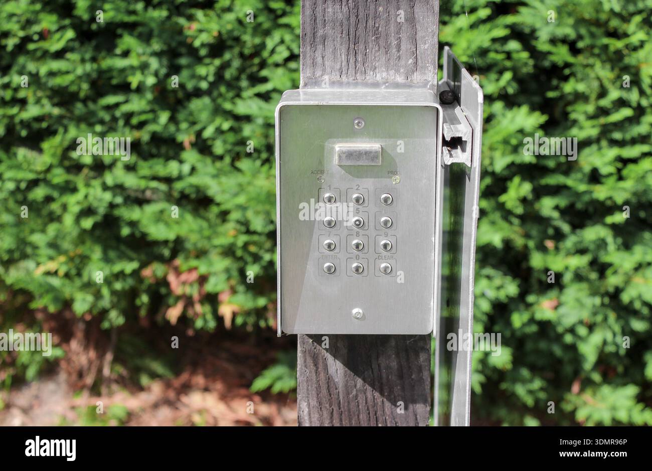 Secure password on keyboard for opening the gate door. Password code Security keypad system protected on private property. The security combination. Stock Photo