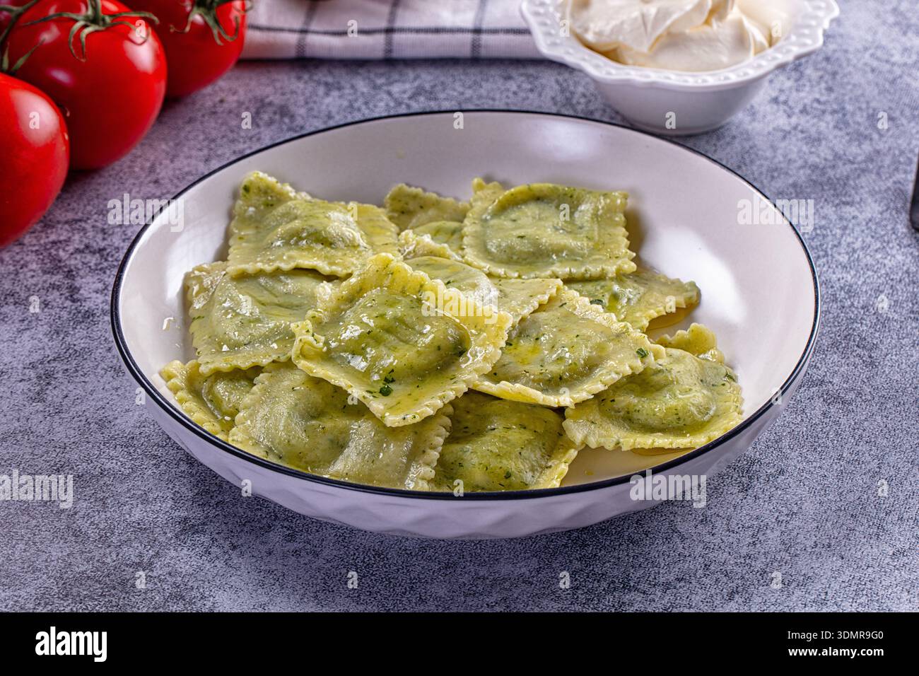 Italian dumplings ravioli with spinach and riccota cheese Stock Photo ...