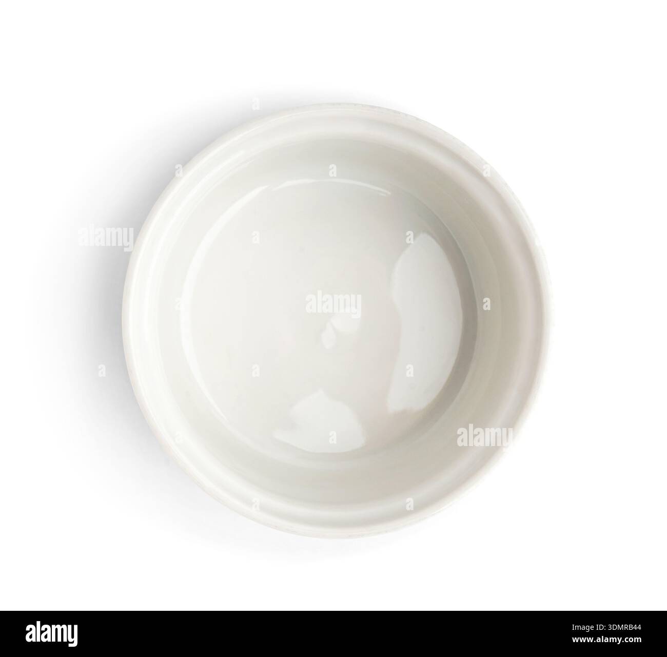 Empty ceramic ramekin isolated on white background Stock Photo