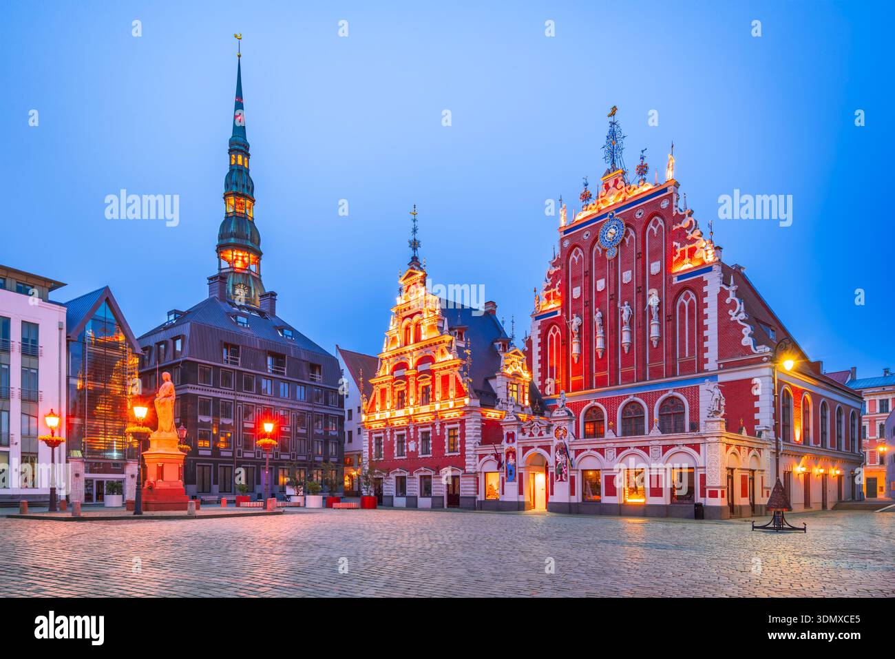 Riga, Latvia. City Hall Square with House of the Blackheads, sunset midnight blue hour. Stock Photo