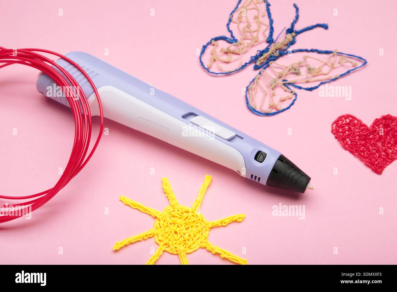 3d handle pen and 3d painting figures on pink background Stock Photo