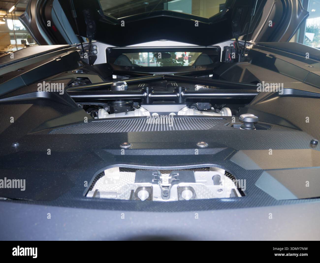 Close-up view of a modern car engine showcasing intricate components ...
