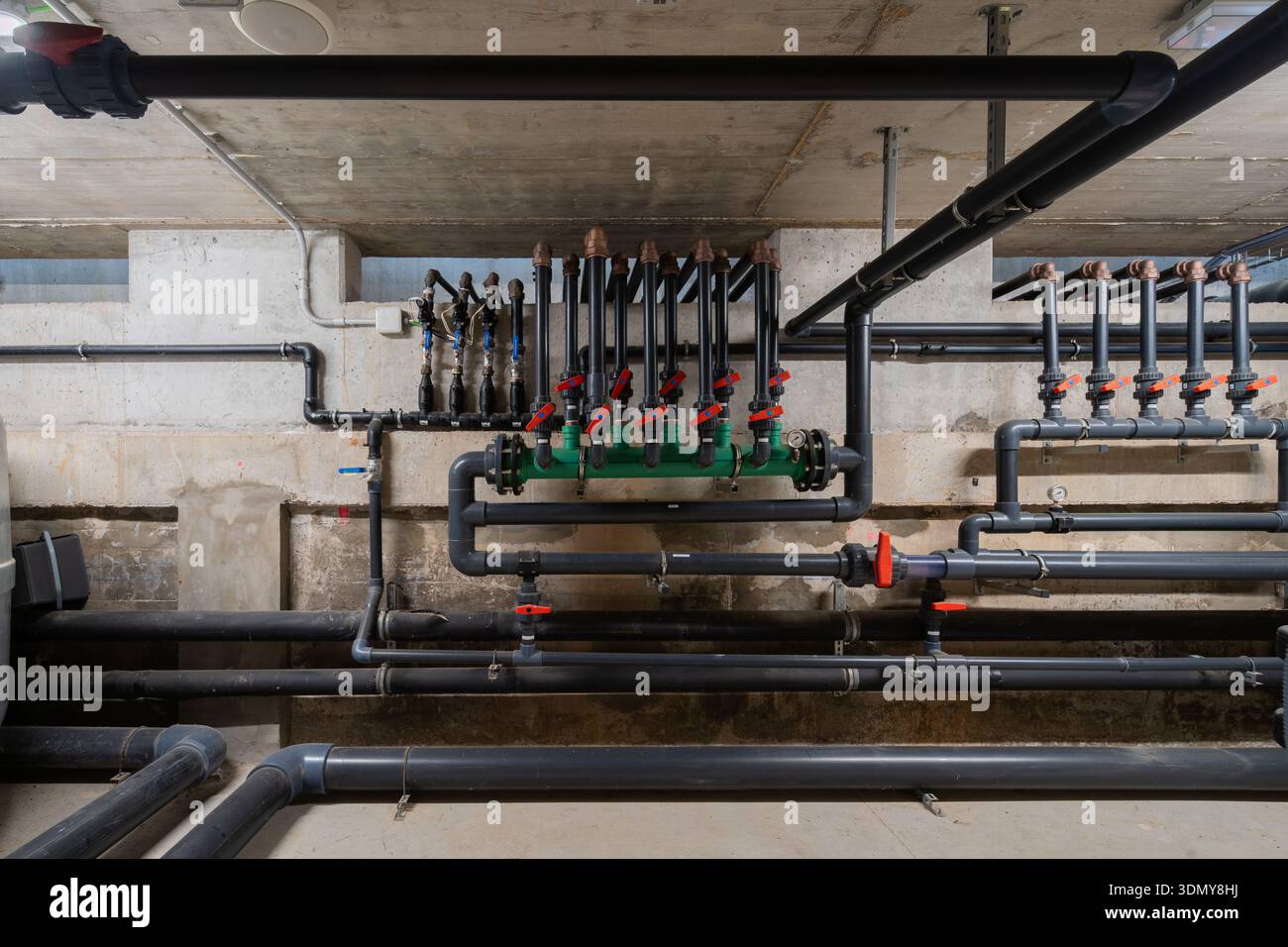 Industrial HVAC system with complex network of ducts and pipes ...