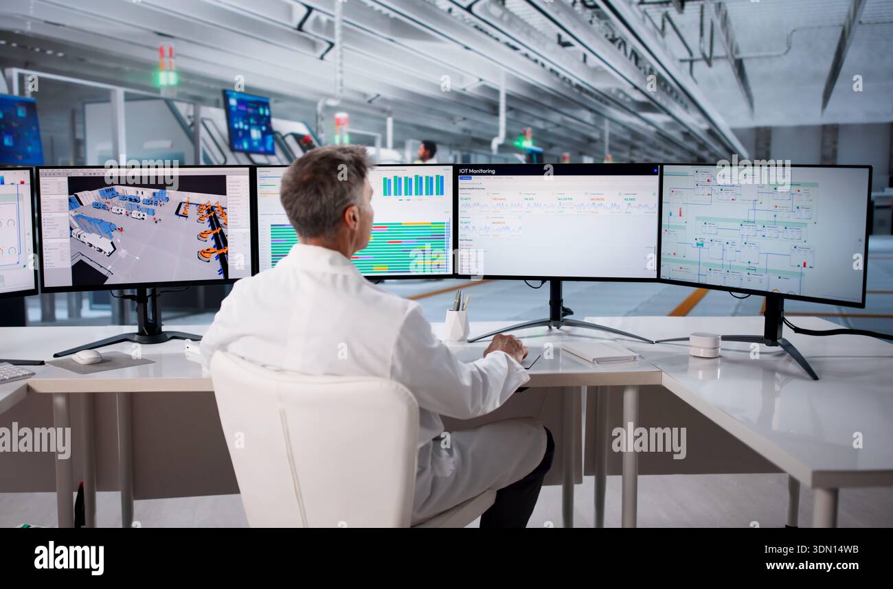 Skilled Engineer Monitoring SCADA System During Manufacturing Process ...