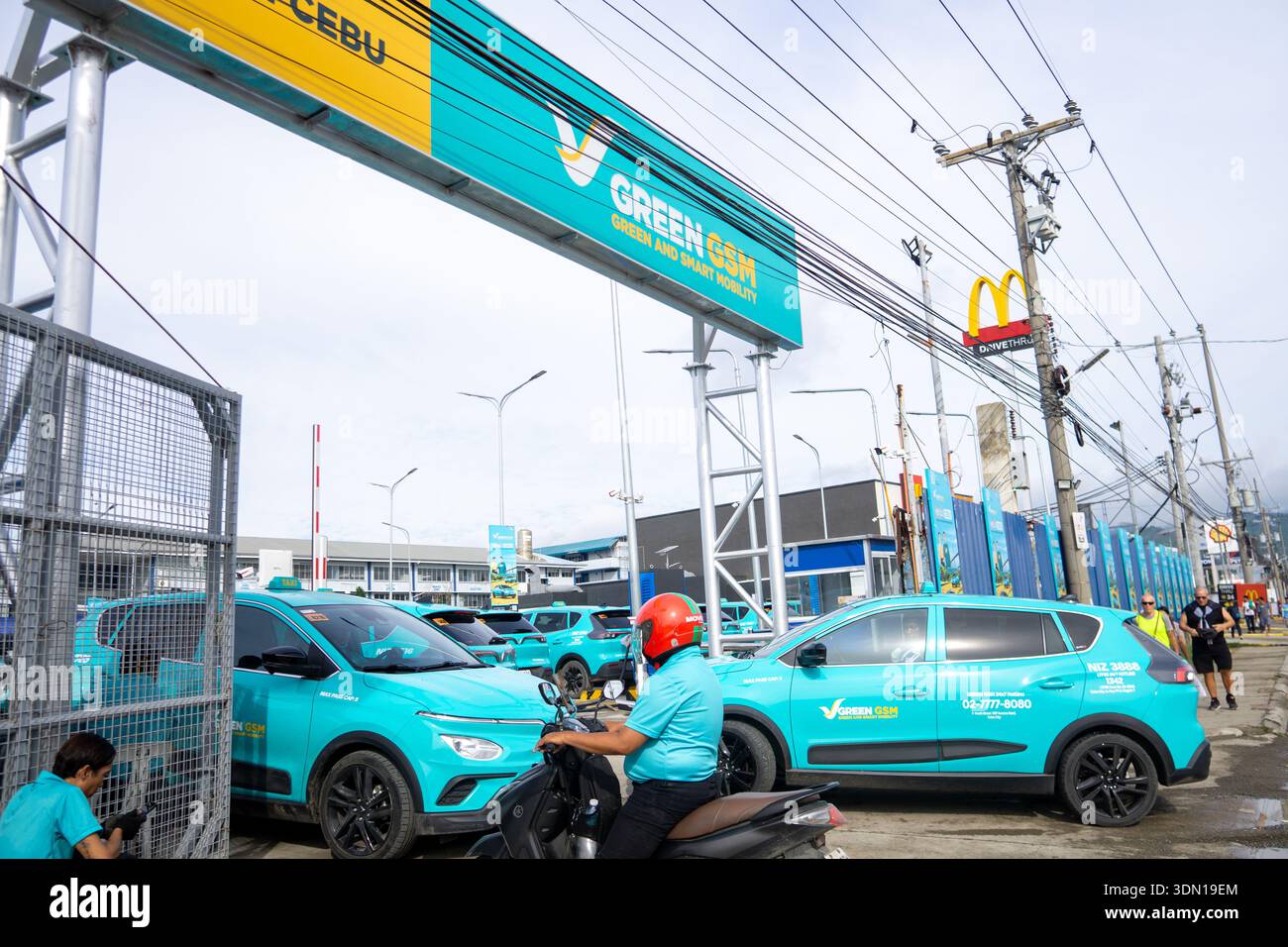 Electric taxi fleet at GSM Green and Smart Mobility depot in Cebu as ...