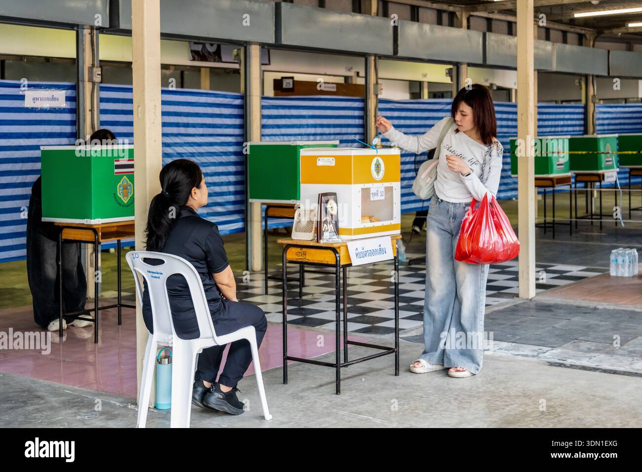 Voter checking in polling station hi-res stock photography and images ...
